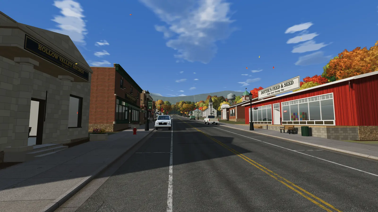 Main Street in October: the bank, brick storefronts, Dottie's Feed &amp; Seed, and the church steeple and water tower at the end